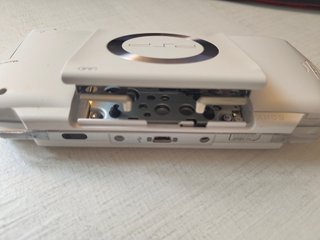 Sony PSP-1004 Blanca + cargador + 3 juegos