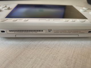 Sony PSP-1004 Blanca + cargador + 3 juegos