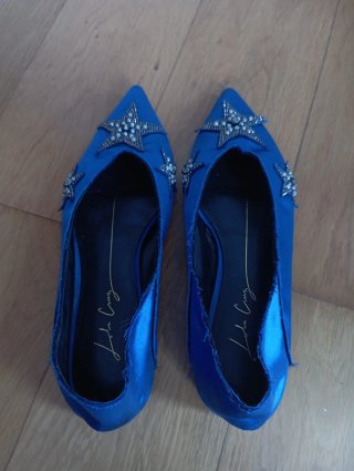 Zapatos planos azules con estrellas 39