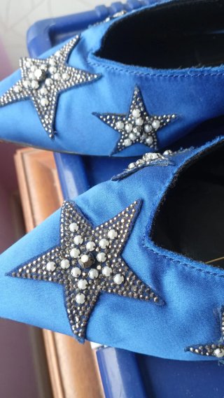 Zapatos planos azules con estrellas 39