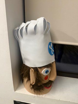 Cabezudo cocinero con gorro