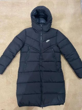 Tuta Nike nera con cappuccio