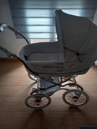 Passeggino per neonati grigio e rame