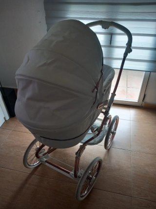 Passeggino per neonati grigio e rame