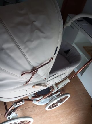 Passeggino per neonati grigio e rame