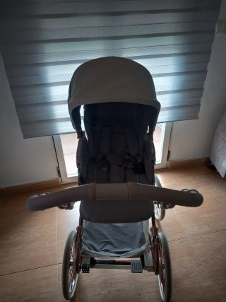 Passeggino per neonati grigio e rame