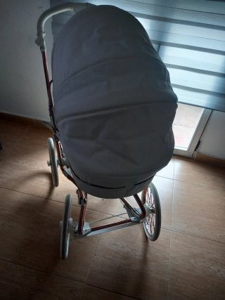 Passeggino per neonati grigio e rame
