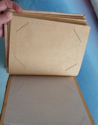 Album porta foto artigianale con disegno africano