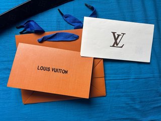 Cintura Louis Vuitton logo argento