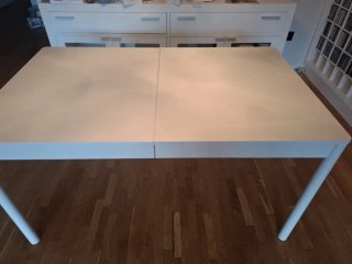 Mesa comedor extensible gris y blanca Ikea