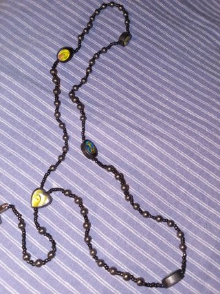 Rosario con cruz y medallas