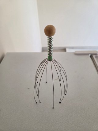 Massaggiatore testa metallo con sfera