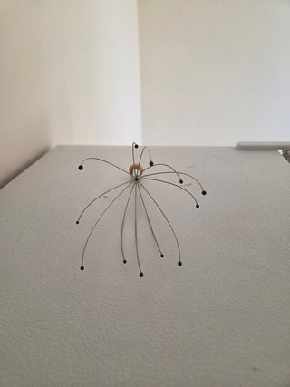 Massaggiatore testa metallo con sfera