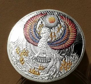 Moneda Ave Fénix amuleto