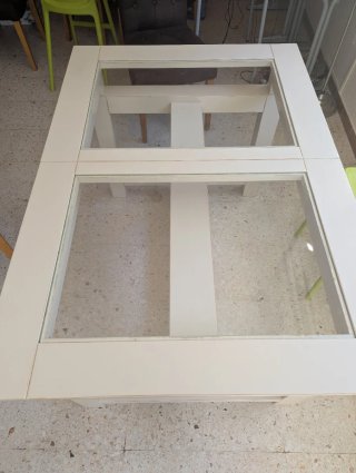 Mesa de comedor extensible de cristal y madera