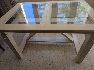 Mesa de comedor extensible de cristal y madera