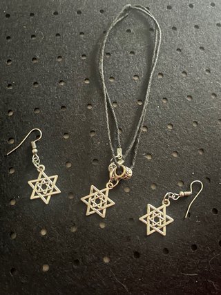 Conjunto collar y pendientes estrella plata
