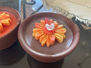 Candele profumate in terracotta