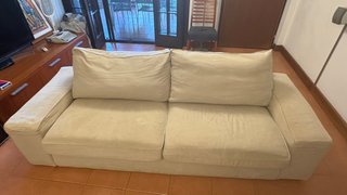 Divano beige in tessuto