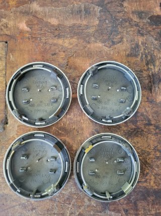 Tapa bujes Llantas Audi Original Doradas 4 unidad
