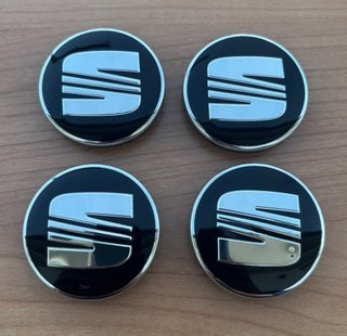 4 Tapabujes SEAT 56mm negro plata originales nuevo