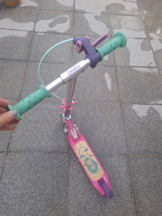Patinete infantil rosa con freno