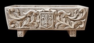 Jardinera de piedra con relieve floral