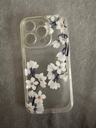 Funda iPhone 14 Pro transparente con flore blancas
