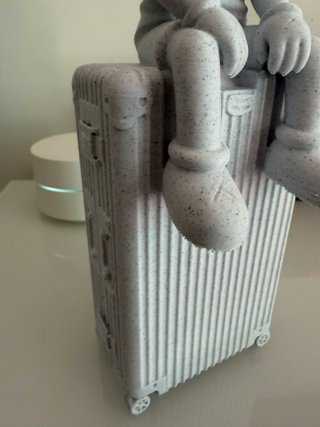 Figura Kaws Viajero