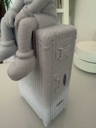 Figura Kaws Viajero