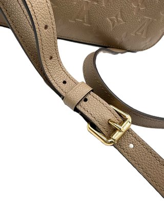 Borsa Louis Vuitton Métis in pelle beige