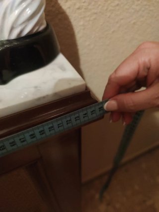 Cubre radiador de madera y marmol