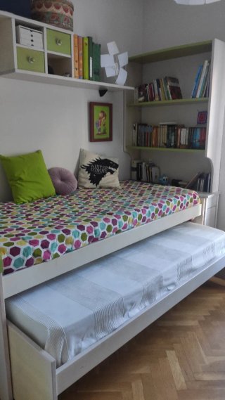 Cama nido juvenil con cajones más estanterías