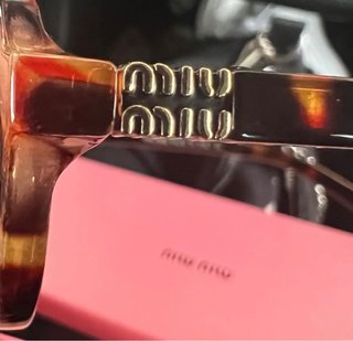 Óculos de grau Miu Miu tartaruga