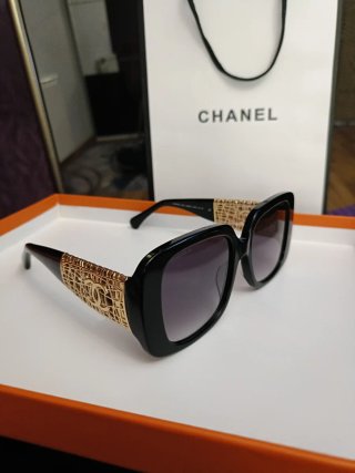 Gafas de sol Chanel lujo negras y doradas