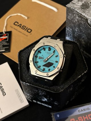 Reloj G-Shock Turquesa y Plateado