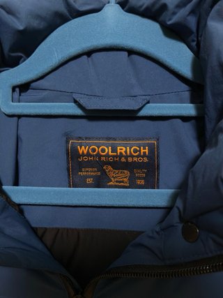 Piumino Woolrich blu con cappuccio