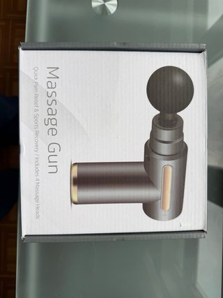 Pistola de masaje