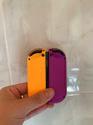 Coppia di Joycons Nintendo Switch Viola Arancione Nuovi