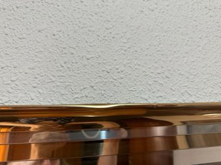 Espejo de pared dorado y metal