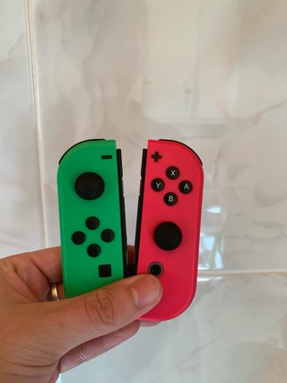 Coppia di Joycons Nintendo Switch Verde Rosa Fucsia