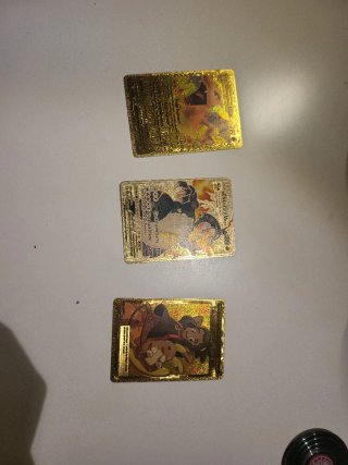Lote Cartas Pokémon Doradas y Negras