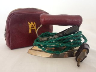 Plancha de viaje marca Fuego con funda a juego