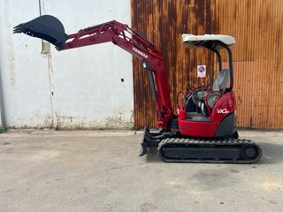 Mini excavadora roja