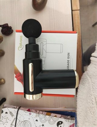 Pistola de masaje