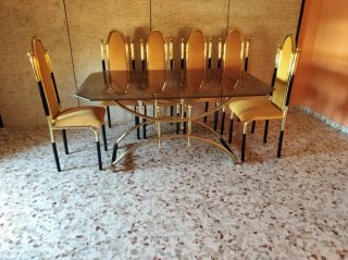 Mesa de centro cristal y metal con 6 sillas.