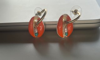 Pendientes concha naranja Parfois