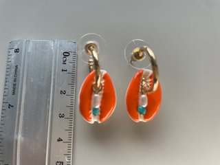 Pendientes concha naranja Parfois