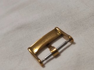 Fibbia Omega Oro