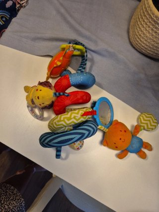 Juguete musical para carrito de bebé
